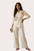 FLORAL EMBROIDERED WRAP TOP - OFF-WHITE