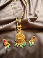 Temple Jewelry Gold Necklace Set with Lakshmi Pendant, Red Stones & Green Beads