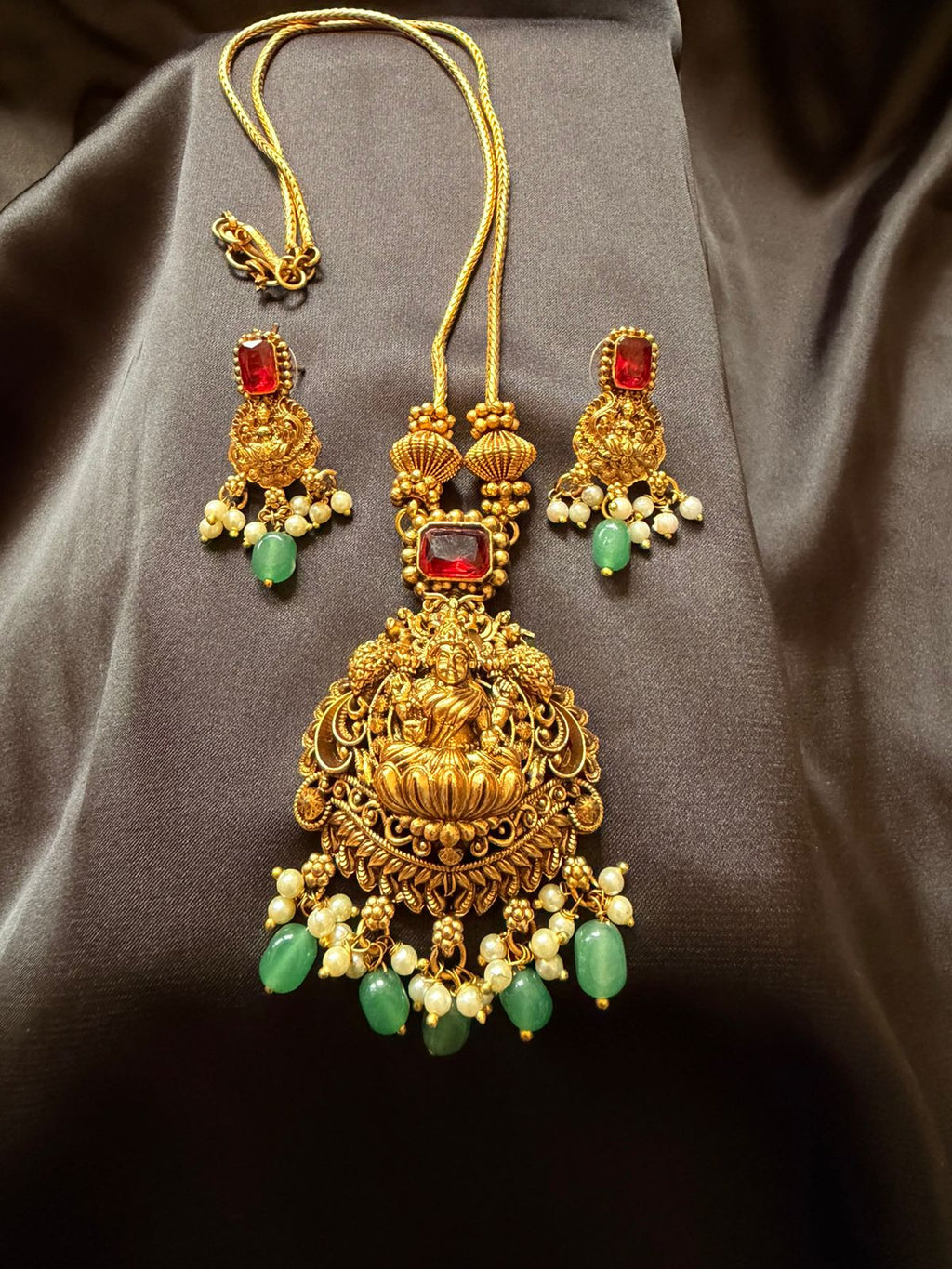 Temple Jewelry Gold Necklace Set with Lakshmi Pendant, Red Stones & Green Beads