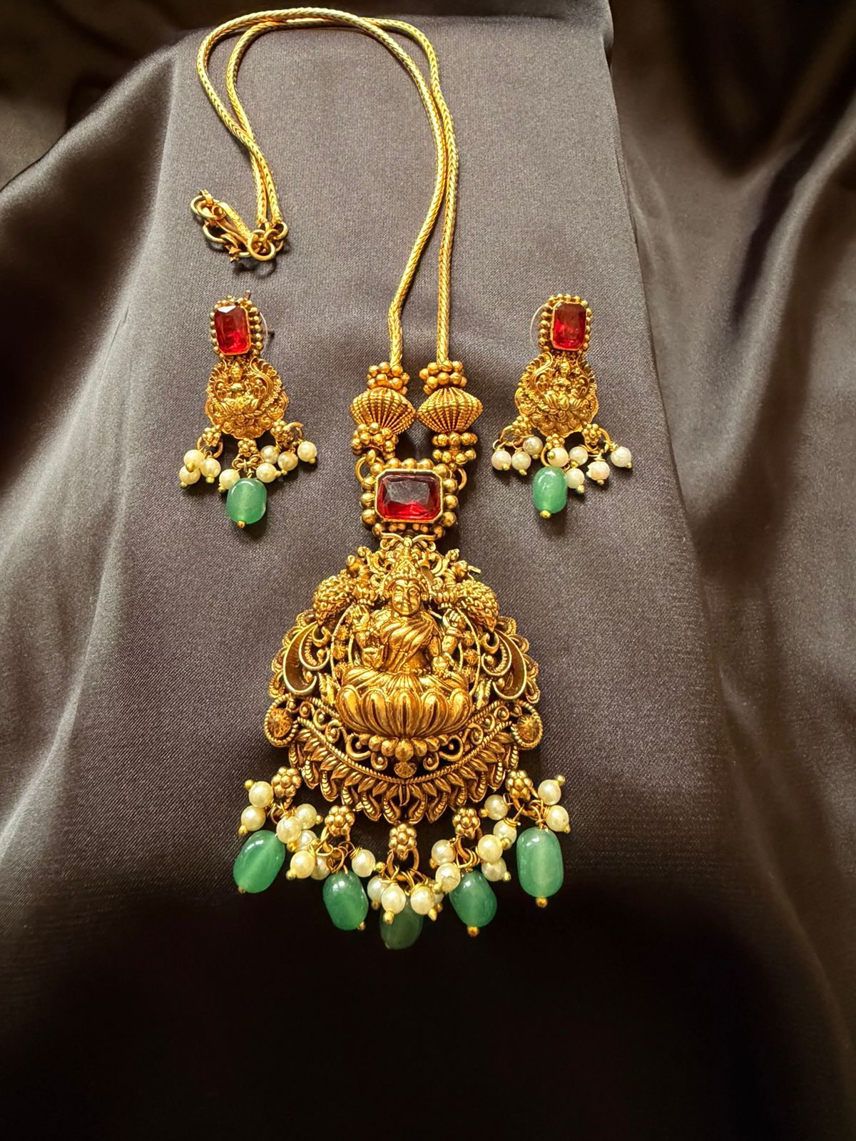 Temple Jewelry Gold Necklace Set with Lakshmi Pendant, Red Stones & Green Beads