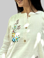 BREATHABLE IVORY COTTON SHORT KURTA WITH FORAL EMBROIDERY
